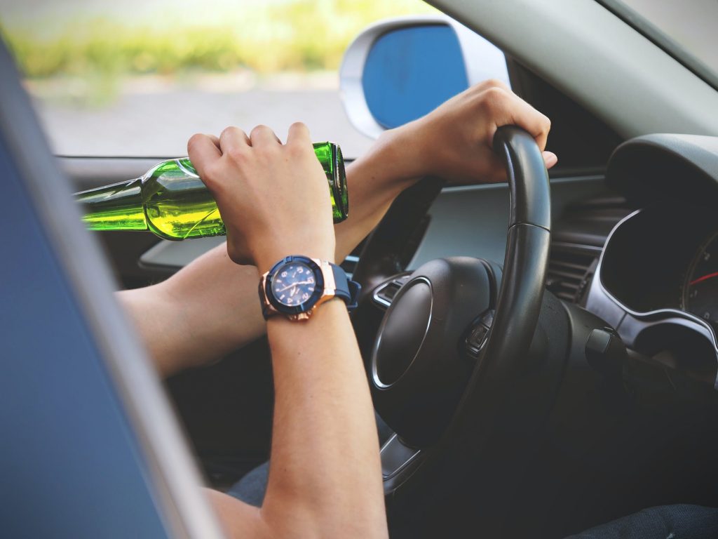 Dangerous Driving - man drink driving